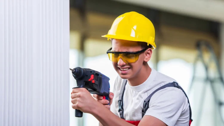 Drilling with protective goggles on