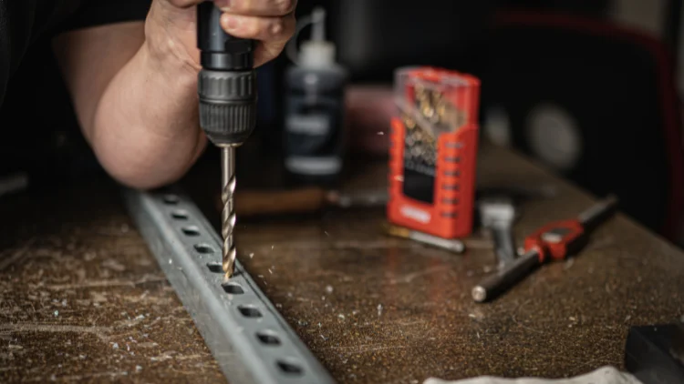 Drilling holes in metal using a cordless drill