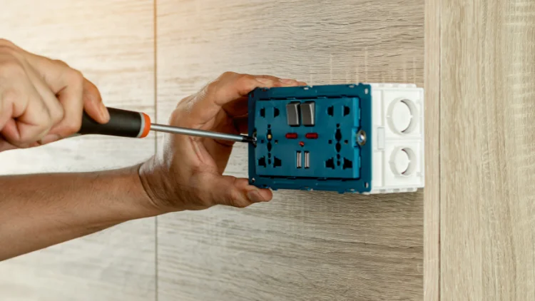 Installing the socket using an insulated screwdriver