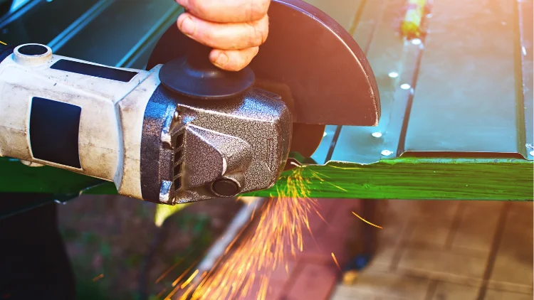 Cutting with a handheld angle grinder